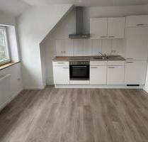 Dachgeschosswohung in Wiesmoor Voßbarg - Kanallage