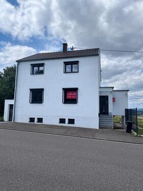 Foto - Freistehendes Einfamilienhaus in grüner Lage