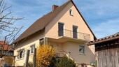 Foto - Einfamilienhaus mit Garage und Garten