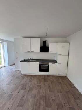 Foto - Neue Erdgeschosswohnung mit EBK und Terrasse