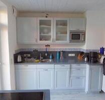 Gepflegte 3,5 Zimmer Hochparterre-Wohnung mit Balkon und Garten - Schleswig