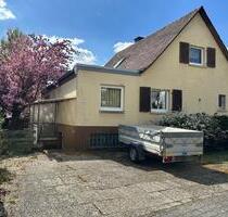 Einfamilienhaus mit Nebengebäude zu verkaufen. - Eschborn