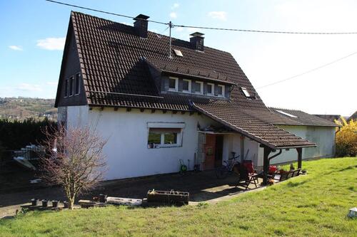 Foto - Einfamilienhaus mit Einliegerwohnung + Baugrundstück