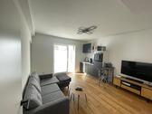 Foto - Moderne Singlewohnung mit Balkon und Küche