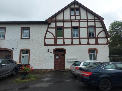 Foto - Mehrfamilienhaus mit Gewerbeeinheit und Grundstück