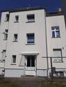 Foto - Mehrfamilienhaus mit Grundstück + Garagen + Garten(haus)
