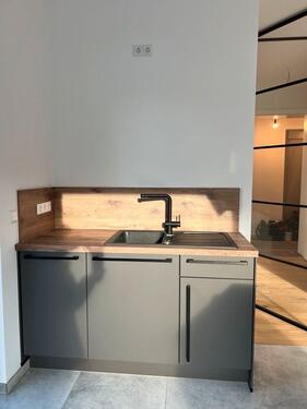 Foto - Erdgeschosswohnung mit Terrasse und moderner Küche