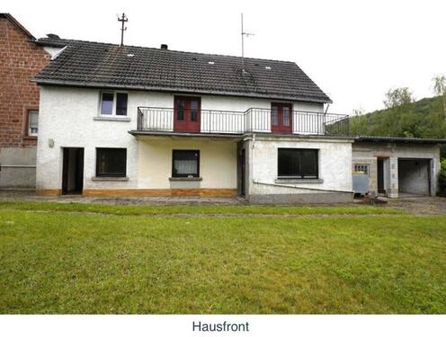 Foto - Einfamilienhaus mit Garage und Garten