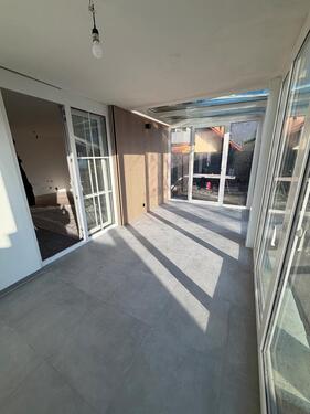 Foto - Modern geschnittene 2,5 Zimmer Wohnung mit Wintergarten