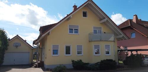 Foto - Einfamilienhaus mit Einliegerwohnung