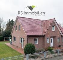 Neuwertiges Einfamilienhaus mit pflegeleichtem Garten in der 