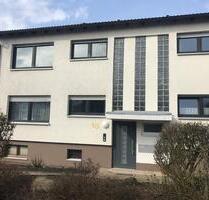Eigentumswohnung + Souterrainwohnung + Garage + Wintergarten - Korbach