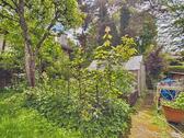 Foto - Hobbyhaus mit Garten im Zentrum