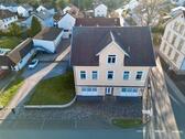 Foto - Wohn- und Geschäftshaus 