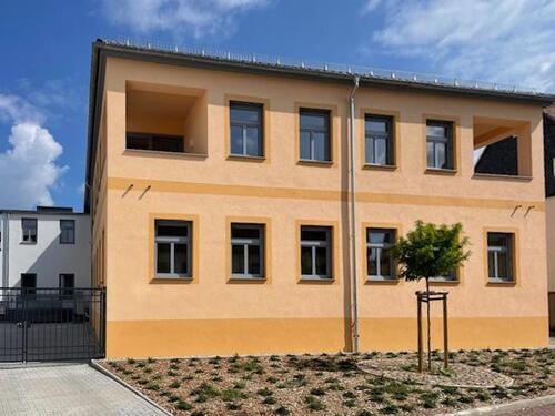 Foto - Altersgerechte und hochwertige 2-Zimmer-Wohnung mit Balkon, Einbauküche und ebenerdiger Dusche