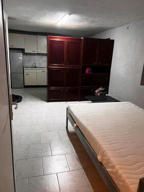 Foto - Zimmer mit eigener Küche und Bad für eine Person