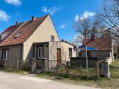 Foto - Siedlungshaus mit großem Grundstück & Baugenehmigung