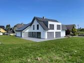 Foto - Einfamilienhaus mit Doppelgarage in Feldrandlage