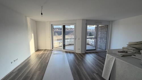 Foto - Neuwertige 3-Zi-Wohnung mit moderner Küche, Balkon und Waldblick