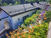 Foto - Wohnen, wo andere Urlaub machen. Sonnenterrasse(n) mit Waldblick