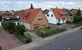 Foto - Einfamilienhaus & Mehrfamilienhaus auf einem Grundstück