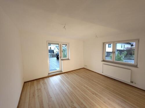 Foto - 4-Zimmer Hochparterre mit Balkon und Gartenanteil