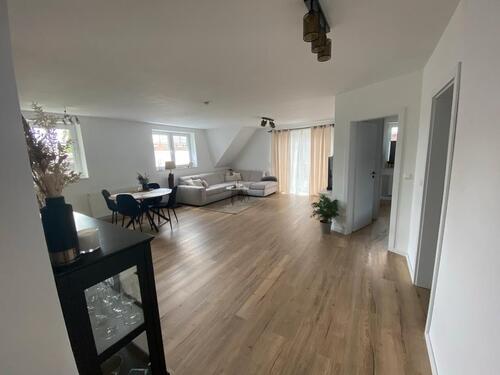 Foto - Moderne und zentrale Eigentumswohnung mit Kamin, Balkon & Carport