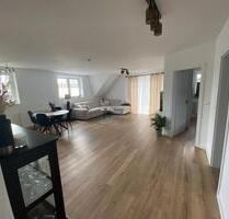 Moderne und zentrale Eigentumswohnung mit Kamin, Balkon & Carport - Ganderkesee