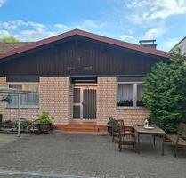 Bungalow mit angrenzendem Garten und 3-Familienhaus (vermietet) - Rodalben