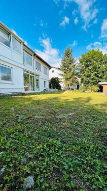 Foto - Moderne 3-Zimmer-Wohnung mit Einbauküche, Wintergarten und Garten