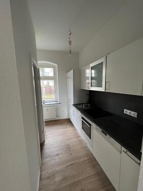 Foto - Charmante 1-Zimmer-Erdgeschosswohnung mit Parkblick und EBK