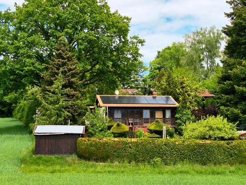 Foto - Holzhaus in absoluter Ruhelage und Autark, PV, Sauna, Pizzaofen