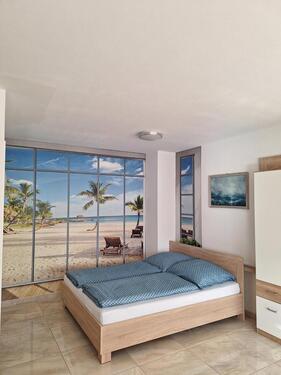 Foto - Helles 1-Zimmer-Apartment mit Terrasse und Garten – 880 € warm