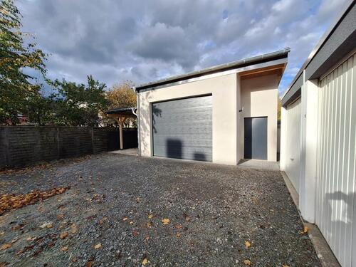 Foto - Troisdorf Mitte, Neubau Erstbezug, Großraumgarage mit Carport!