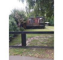 Holz-Bungalow mit Bootssteg am Eicher See