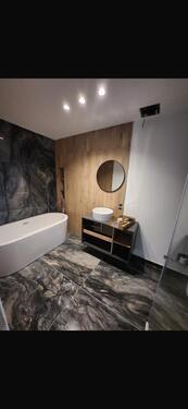 Foto - Luxuriöse 2-Zimmer-Wohnung mit Einbauküche und eigenem Garten