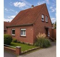 Charmantes Zweifamilienhaus mit Garten und 2 Garagen - Bramsche