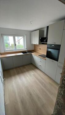 Foto - Frisch sanierte 4 Zimmer Wohnung (EG) mit Garten und Einbauküche