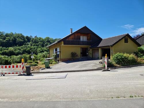 Foto - Einfamilienhaus mit Einliegerwohnung