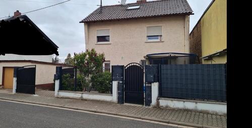 Foto - Einfamilienhaus mit Einliegerwohnung