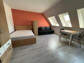 Foto - Gemütliche 1-Zimmer-Dachgeschosswohnung – Voll möbliert