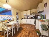 Foto - Attraktive 3,5-Zimmer-Dachgeschosswohnung mit Garten & Carport