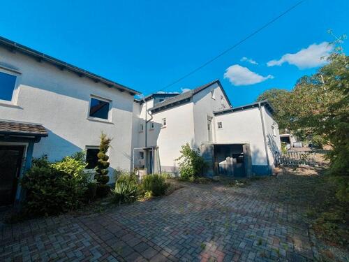 Foto - Zwei Häuser – ein Zuhause mit vielfältigen Möglichkeiten
