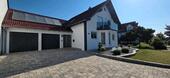 Foto - Schönes Einfamilienhaus mit Einliegerwohnung und Doppelgarage