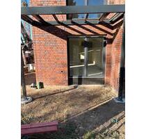 Moderne Neubau-Erdgeschosswohnung mit Garten in Rheinberg-Budberg