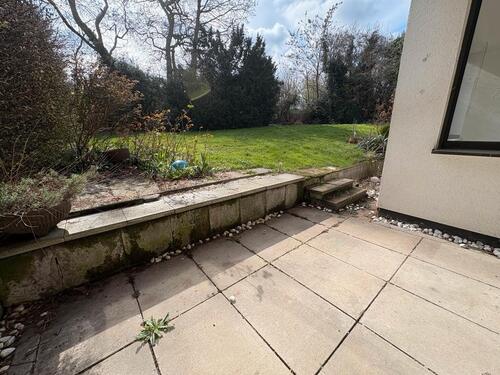Foto - 3-Zimmer-Souterrainwohnung mit Terrasse und Gartenmitnutzung