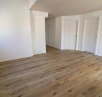 Lichtdurchflutete Maisonette-Wohnung mit zwei Balkonen in Mehrstetten - Erstbezug!