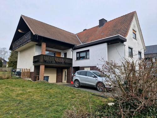 Foto - Einfamilienhaus mit 2 Wohneinheiten