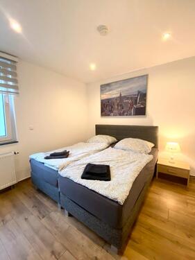Foto - Erdgeschosswohnung mit Einbauküche und Stellplatz