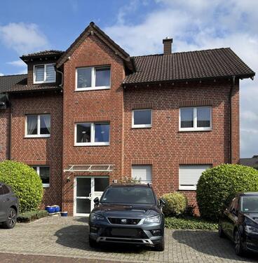 Foto - Moderne Erdgeschosswohnung mit überdachter Terrasse und Garten